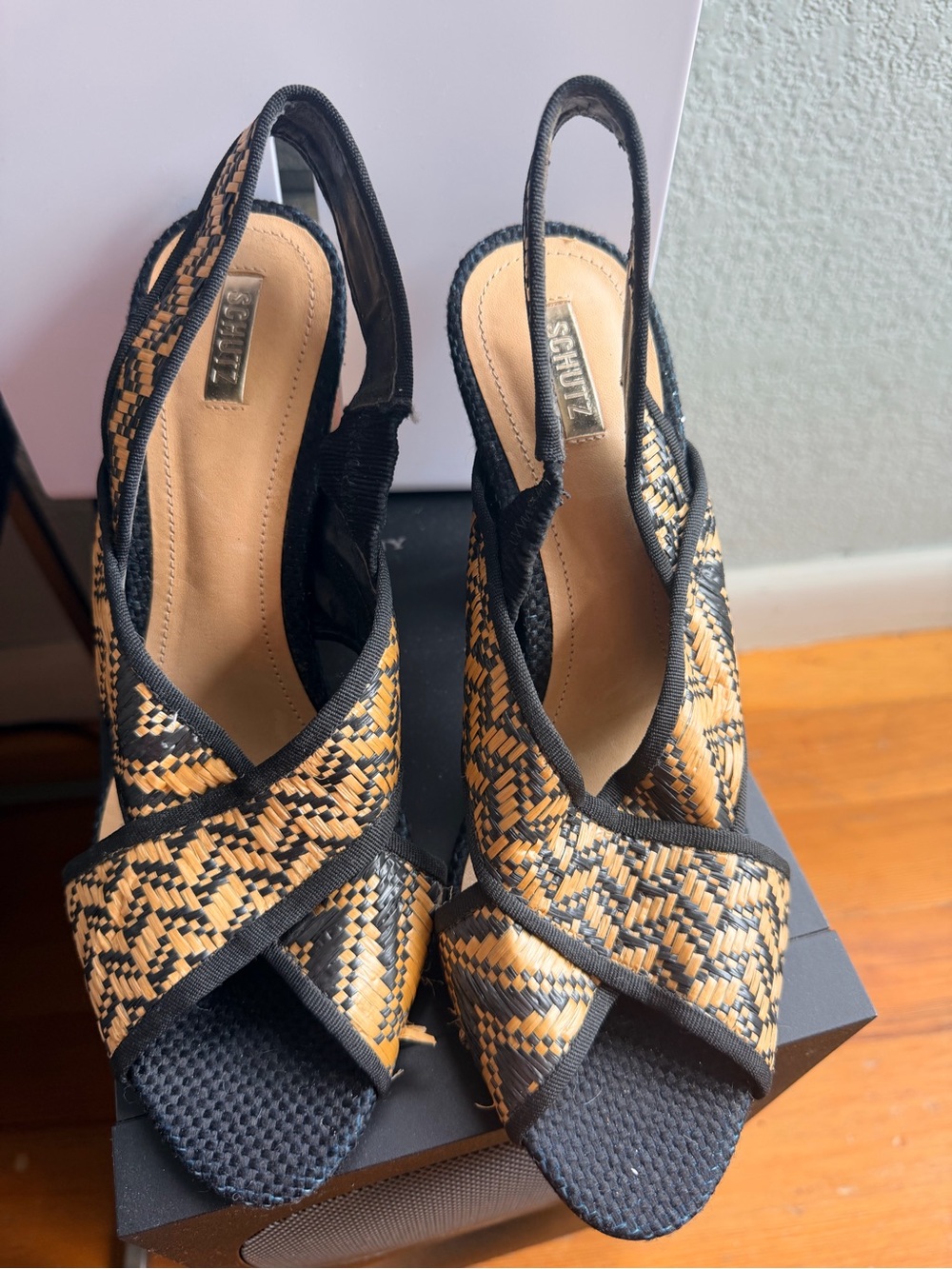 SCHUTZ Black and Natural Woven Cross-Front Slingback Sandals